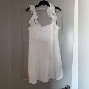 White ruffle sleeved, wrap mini dress.